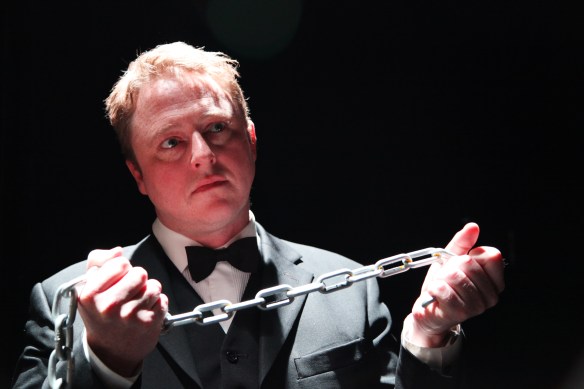 Simon Maiden as Executive Master Bot