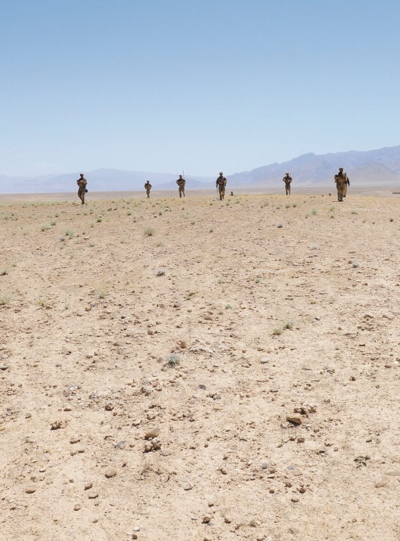 Members of Mentoring Team One, part of Mentoring Task Force - Four, move across the the 'Dasht' (desert) during a mentored patrol with members of the Afghanistan National Army in Uruzgan. Photo courtesy of the Australian Defence Force