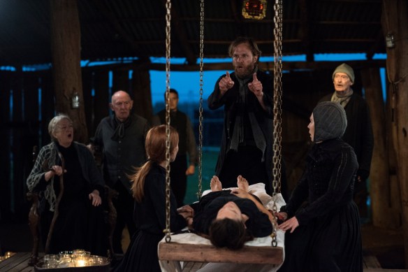 Julian Garner (centre) as John Proctor. Photo: Seiya Taguchi