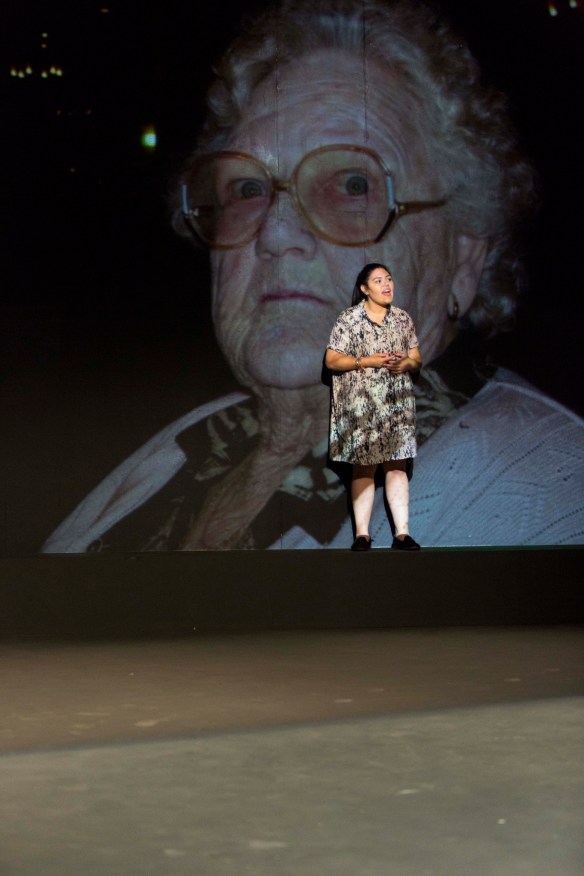 Nakkiah Lui in front of a photograph of her nana Joan. Photo: Brett Boardman